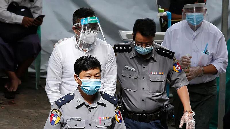 Canadian preacher David Lah is escorted for trial in Yangon, Myanmar June 8, 2020. u00e2u20acu201d AFP pic