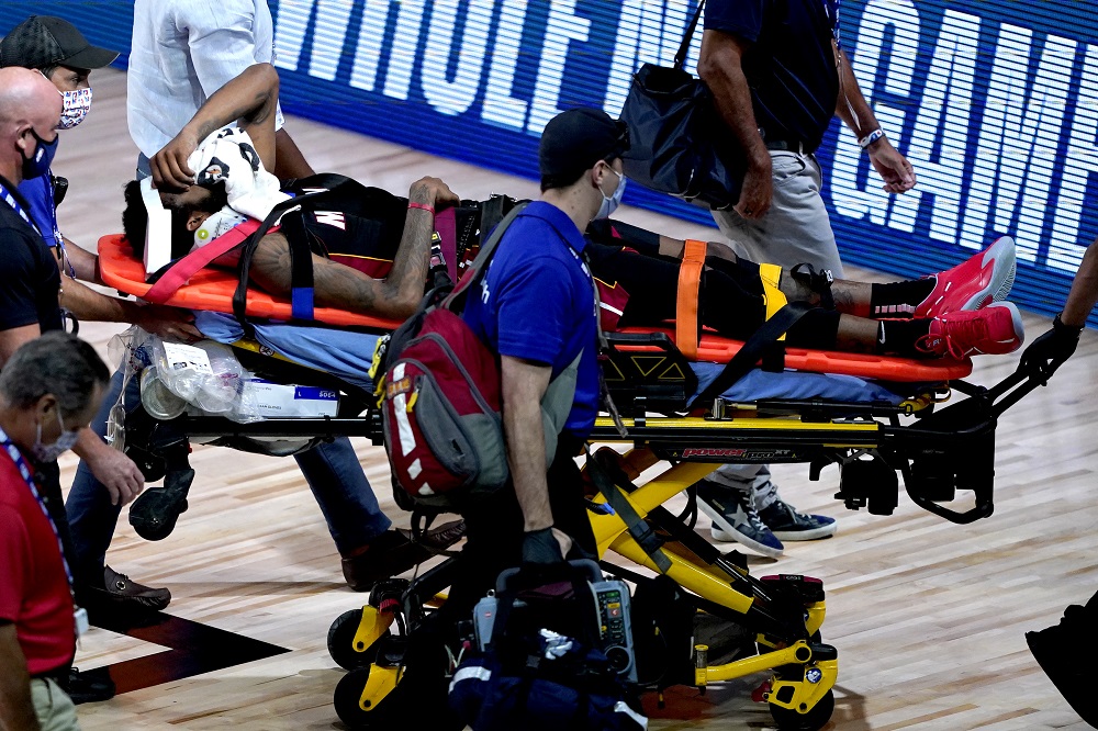 Miami Heat's Derrick Jones Jr is carried off the court on a stretcher after being injured against the Indiana Pacers during the second half of an NBA basketball game at AdventHealth Arena. Ashley Landis/Pool Photo-USA TODAY Sports pic via Reuters