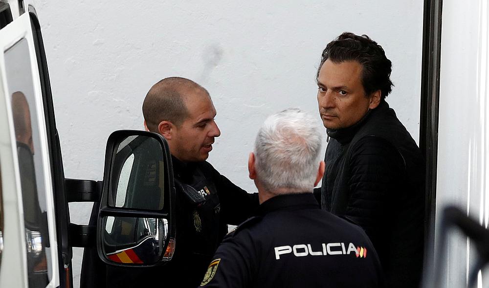 Former chief executive of Mexico's state oil firm Pemex Emilio Lozoya is escorted by Spanish police officers as he leaves a court, in Marbella, Spain February 13, 2020. u00e2u20acu201d Reuters pic