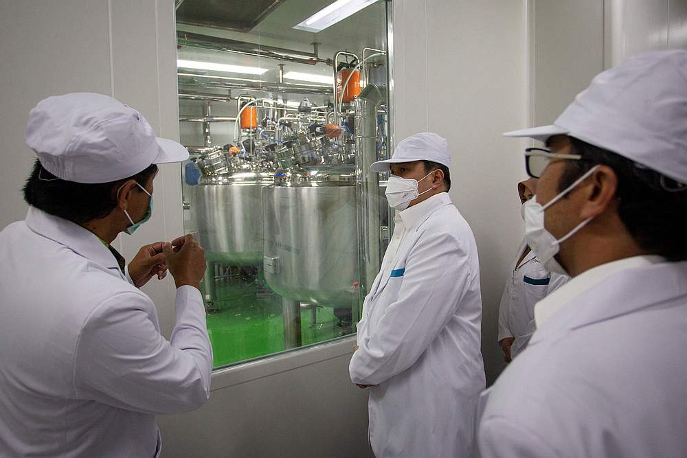 Minister of State Owned Enterprises Erick Thohir tours the vaccine production facility at the Bio Farma office, amid the Covid-19 outbreak in Bandung, West Java, Indonesia August 4, 2020. u00e2u20acu201d Antara Foto via Reuters