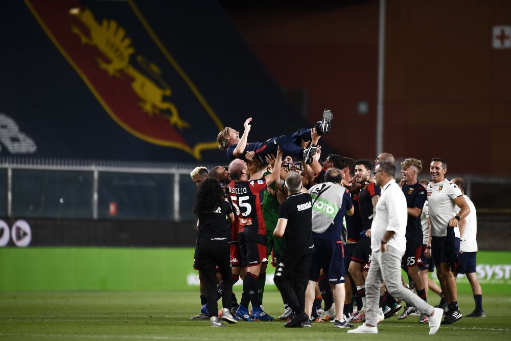 Genoa players celebrate with coach Davide Nicola at the end of the Serie A football match against Hellas Verona August 2, 2020. u00e2u20acu201d Reuters picn