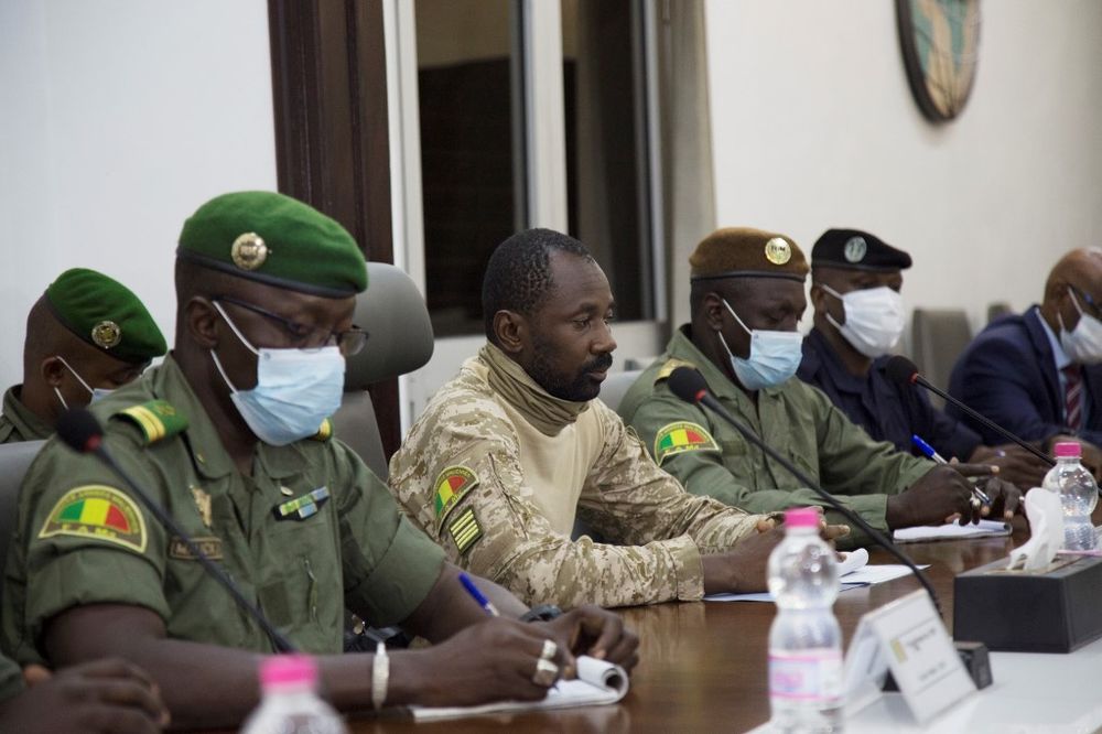 President of the CNSP (National Committee for the Salvation of the People) Assimi Goita (centre) prepares for a meeting between Malian military leaders and an ECOWAS delegation headed by former Nigerian president on August 22, 2020. u00e2u20acu201d AFP pic
