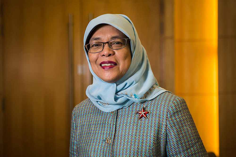 Discrimination at the workplace is particularly disturbing because it deprives the person affected from earning a living, President Halimah Yacob says. u00e2u20acu201d TODAY pic