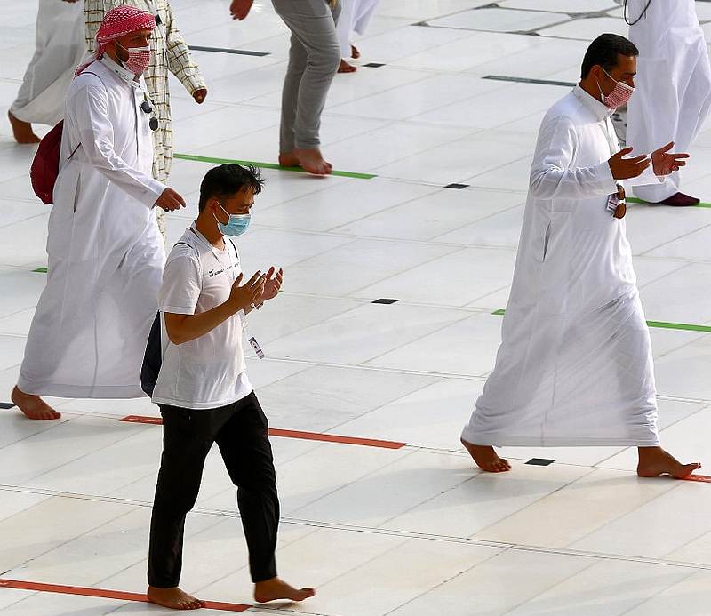 Mask-clad Muslim pilgrims circumambulate around the Kaaba, Islam's holiest shrine, at the centre of the Grand Mosque in the holy city of Mecca, on the last day of the Haj pilgrimage August 2, 2020. u00e2u20acu201d AFP pic