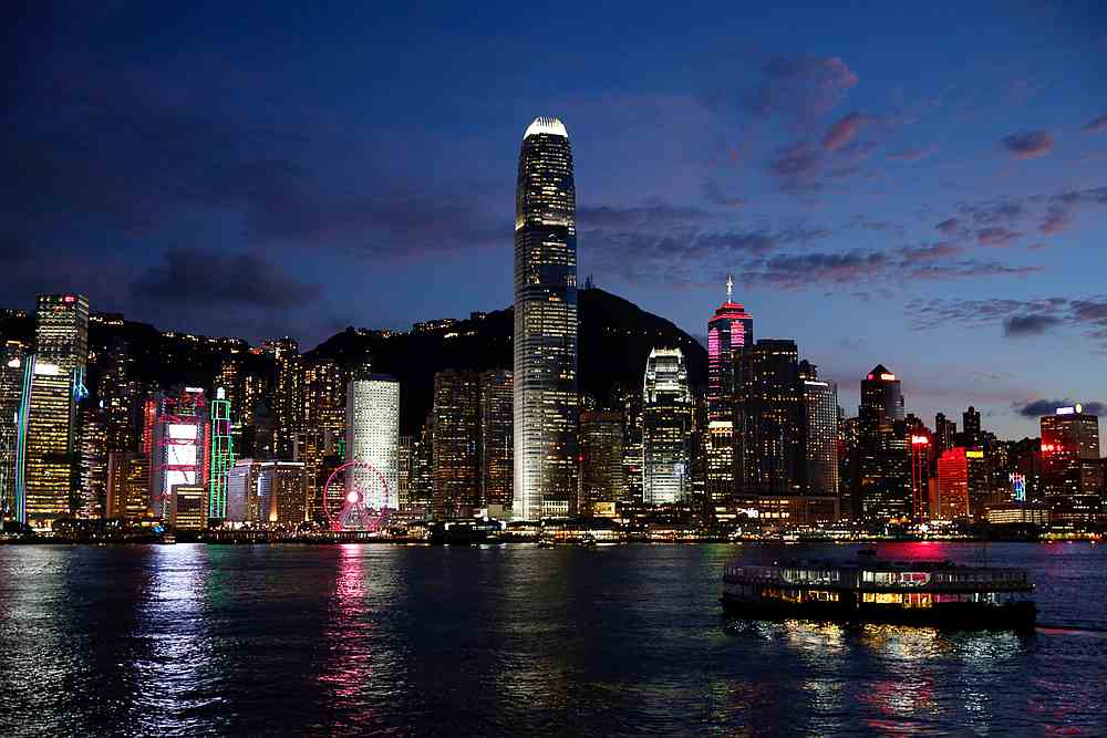 A Star Ferry boat crosses Victoria Harbour in front of a skyline of buildings during sunset in Hong Kong June 29, 2020. u00e2u20acu201d Reuters pic