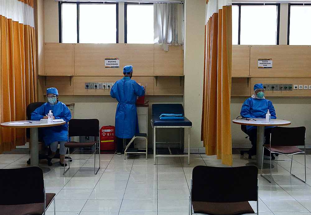 Healthcare workers do a simulation for coronavirus vaccine clinical trials next week at the Faculty of Medicine at Padjadjaran University amid the Covid-19 pandemic in Bandung, Indonesia August 6, 2020. u00e2u20acu201d Reuters pic
