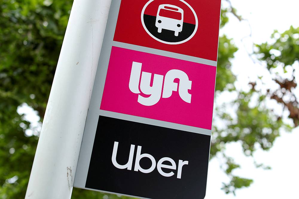 A sign marks a rendezvous location for Lyft and Uber users at San Diego State University in San Diego, California May 13, 2020. u00e2u20acu201d Reuters pic