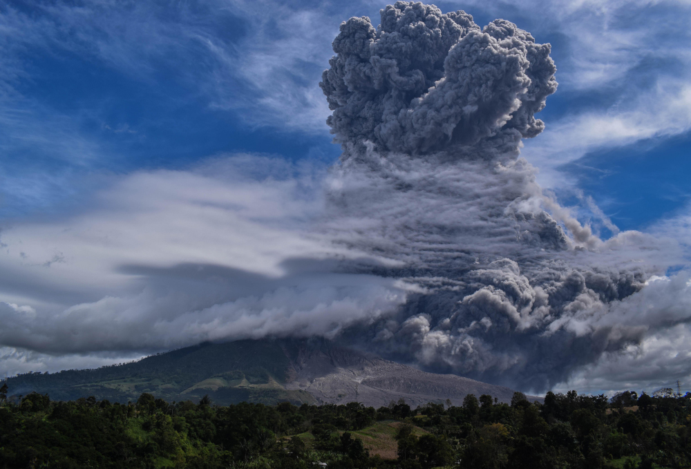 Mount Sinabung spews thick ash and smoke into the sky in Karo, North Sumatra August 10, 2020. u00e2u20acu201d AFP pic 