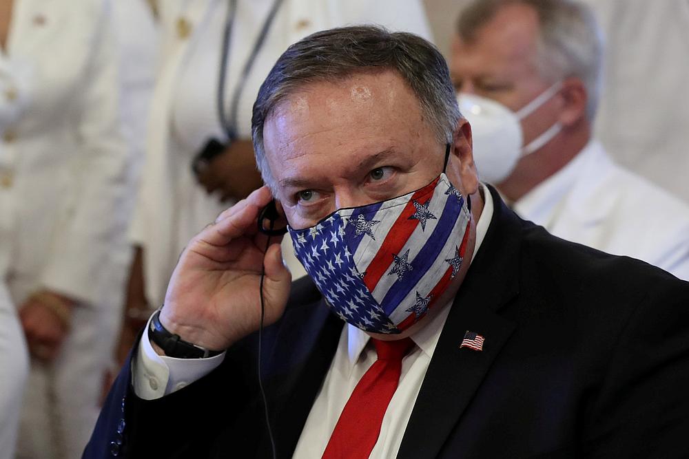 US Secretary of State Mike Pompeo adjusts his earphones during a Te Deum as part of the swearing-in ceremony of Dominican Republic's new President Luis Abinader in Santo Domingo, Dominican Republic August 16, 2020. u00e2u20acu201d Reuters picn