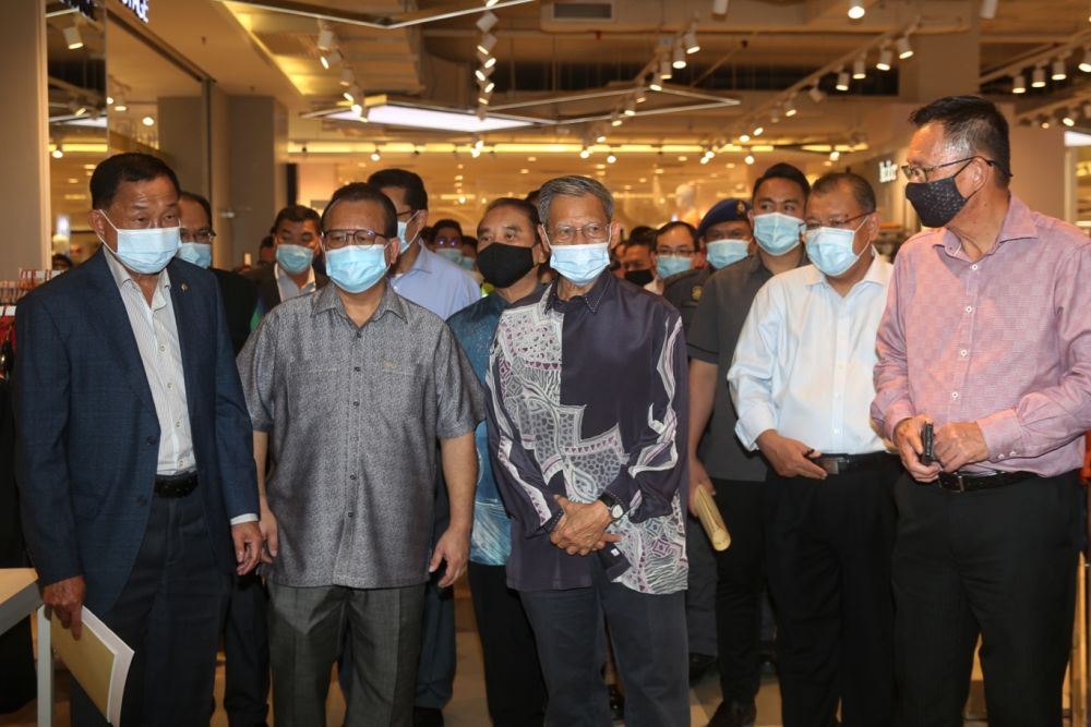 Datuk Seri Mustapa Mohamed (centre) and Datuk Alexander Nanta Linggi (second from left) are pictured during a visit to Sunway Pyramid August 18, 2020. u00e2u20acu2022 Picture by Choo Choy May