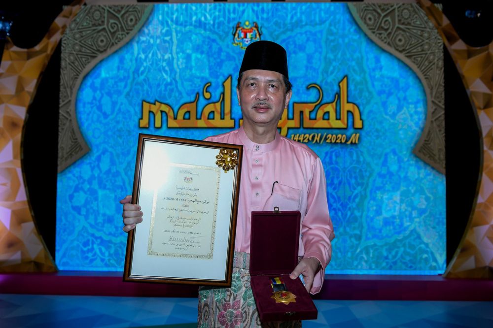 Health director-general Tan Sri Dr Noor Hisham Abdullah was presented with the 2020/1442 Hijrah Maal Hijrah Figure award by the Yang di-Pertuan Agong Al-Sultan at the National Mosque, Kuala Lumpur August 19, 2020. u00e2u20acu201d Bernama pic
