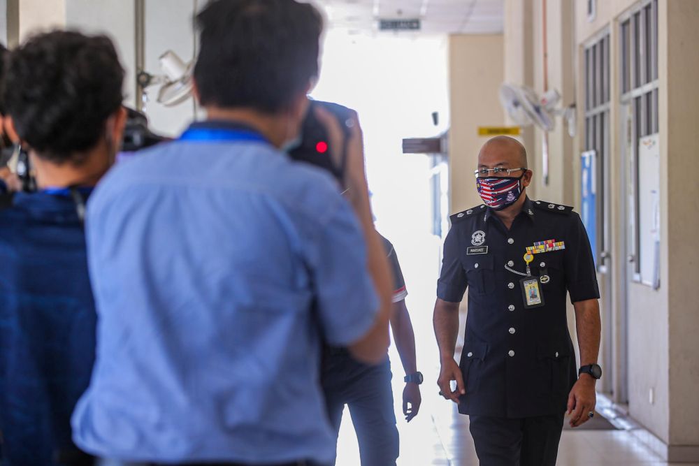 Nilai police chief Supt Mohd Marzukee Besar arrives at the Seremban Court Complex August 26, 2020. u00e2u20acu201d Picture by Hari Anggara