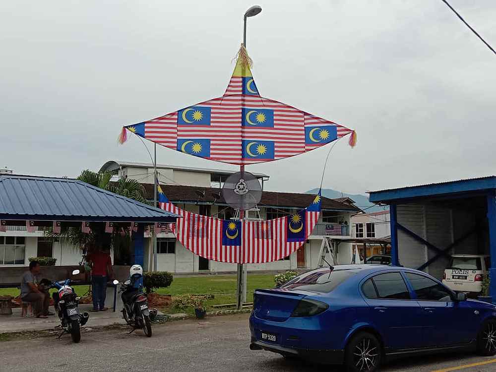 The police officers took around 10 days to finish making the kite. — Picture courtesy of Pertang Police Station