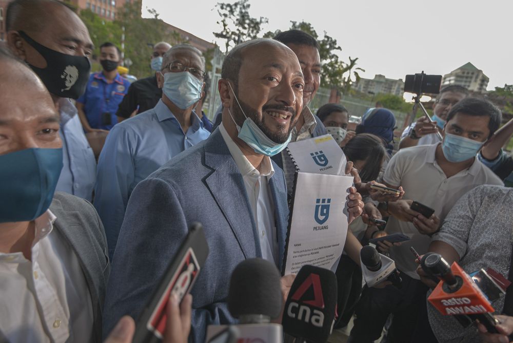 Datuk Seri Mukhriz Mahathir speaks to reporters after submitting the registration of Parti Pejuang Tahah Air at the Department of Registration of Societies in Putrajaya August 19, 2020. u00e2u20acu2022 Picture by Shafwan Zaidon