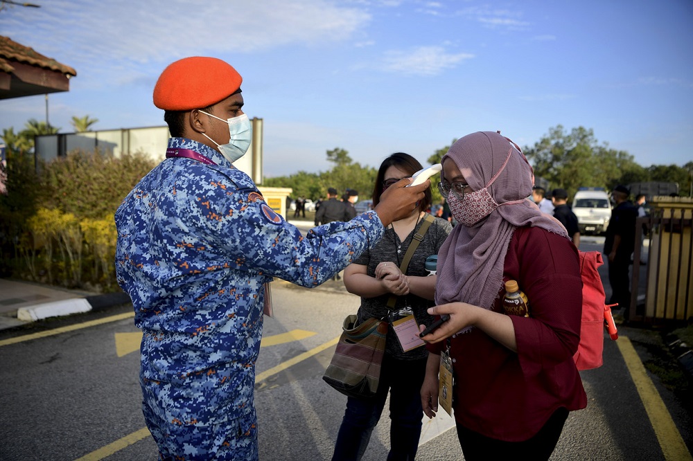 Strict checks were conducted by the Civil Defence Force at the junction before entering the hallu00e2u20acu2122s compound with only relevant parties allowed to enter after their body temperature were taken. u00e2u20acu2022 Bernama pic
