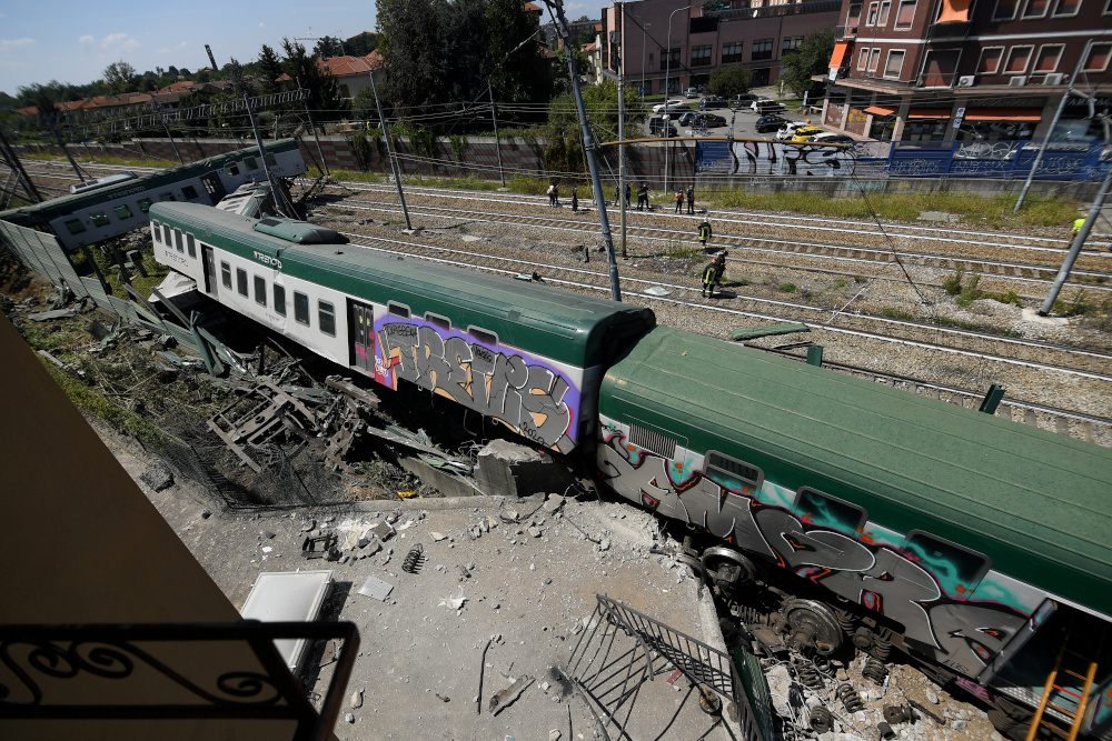 Train carriages are pictured at the scene where a train derailed in Carnate, Italy August 19, 2020. u00e2u20acu201d Reuters pic