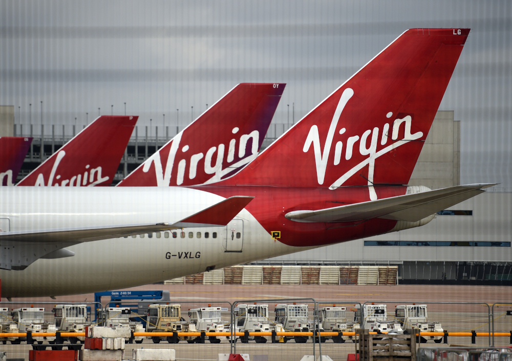 In this file photo taken June 8, 2020, Virgin Atlantic Airline planes on the apron at Manchester Airport in north-west England. u00e2u20acu201d AFP pic 