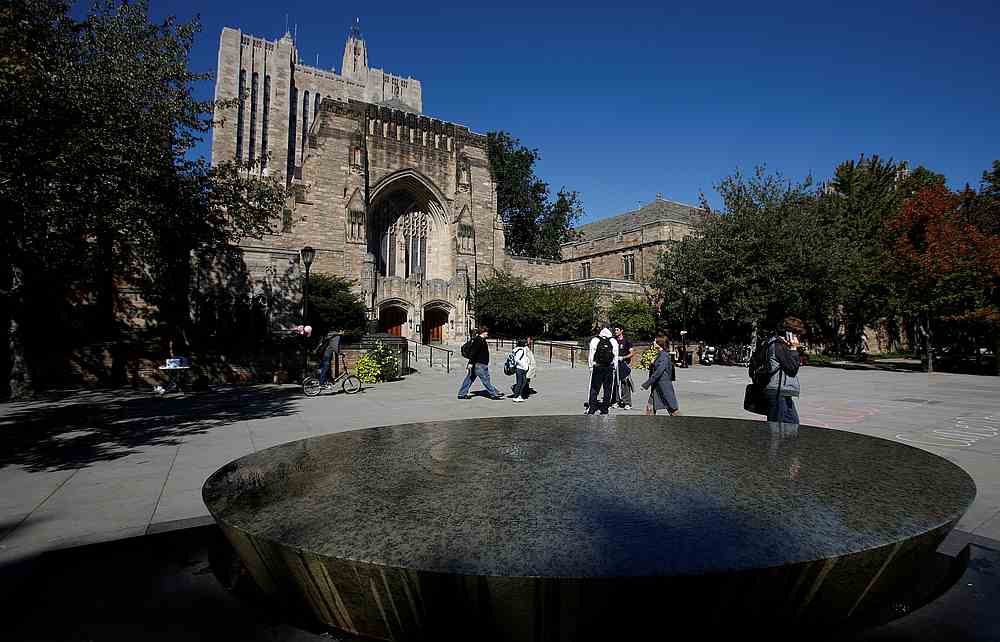 Students walk on the campus of Yale University in New Haven, Connecticut October 7, 2009. u00e2u20acu201d Reuters pic