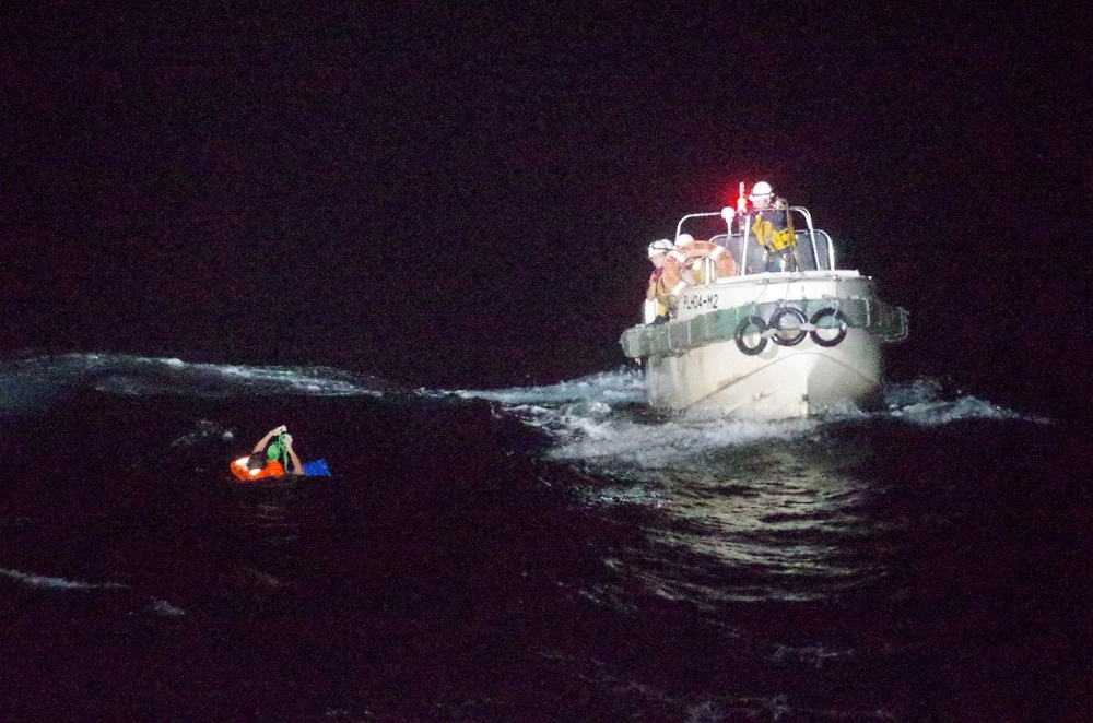 A Filipino crew member believed to be onboard Gulf Livestock 1 is rescued by a Japan Coast Guard boat during their search and rescue operation at the East China Sea, September 2, 2020. u00e2u20acu201d Picture courtesy of Japan Coast Guard Headquarters via Reuters