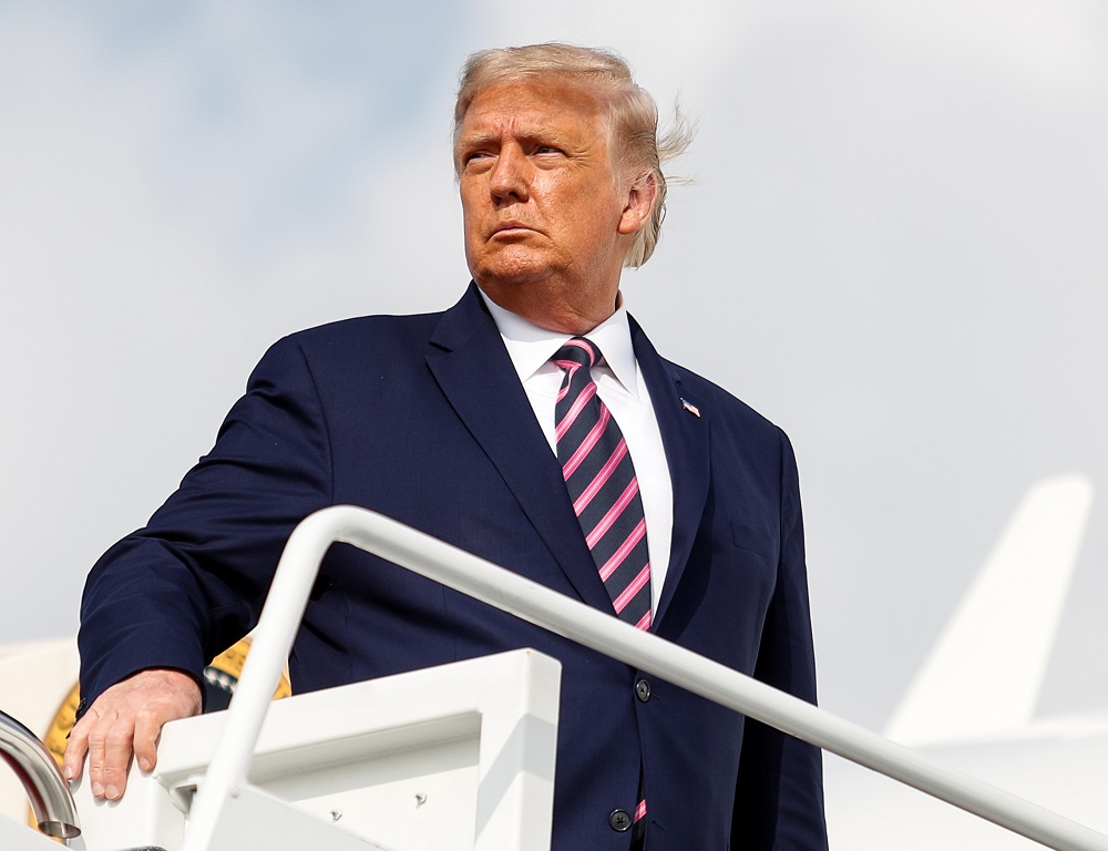 US President Donald Trump boards Air Force One as he departs Washington for campaign travel to Minnesota at Joint Base Andrews, Maryland September 18, 2020. u00e2u20acu201d Reuters pic