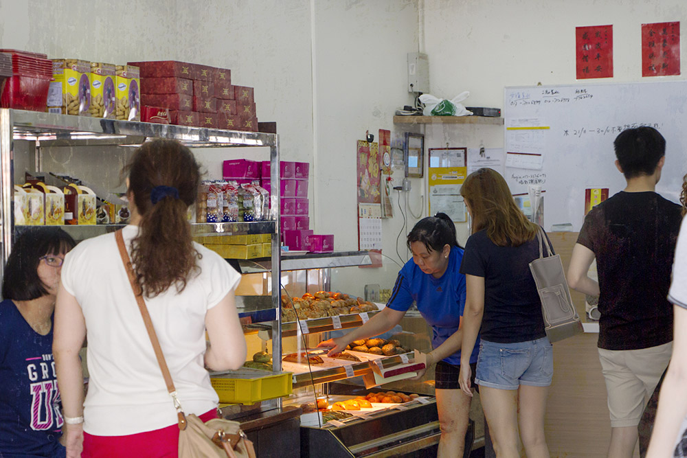 Folks waiting for their turn to buy boxes of their favourite mooncakes.