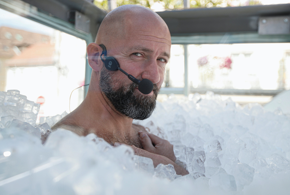 Austrian sportsman Josef Koeberl looks on as he stands still in an ice-filled glass cabin trying to set a World Record of staying in ice, in Melk, Austria September 5, 2020. u00e2u20acu201d Reuters pic