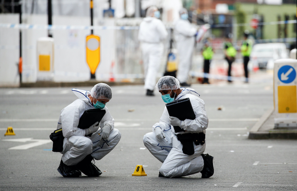 Forensics officers are seen near the scene of reported stabbings in Birmingham, Britain September 6, 2020. u00e2u20acu201d Reuters pic