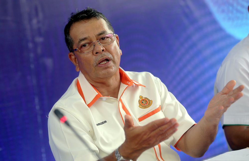 Road Transport Department (JPJ) director-general Datuk Seri Shaharuddin Khalid speaking to the press at the launch of JPJu00e2u20acu2122s enforcement control unit at the Plaza Tol (Old) Jelapang in Ipoh. u00e2u20acu201d Picture by Farhan Najib