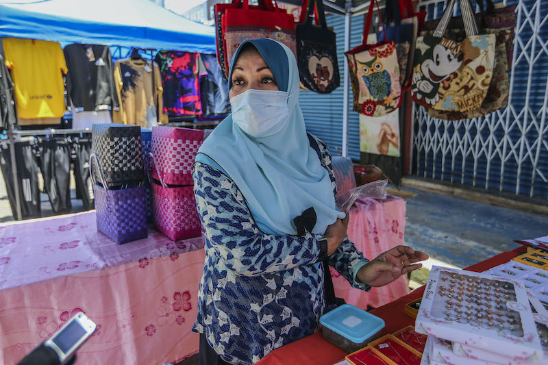 Marian Anchil has a handmade jewellery stall at Gaya Street market in Kota Kinabalu, Sabah September 13, 2020. — Picture by Firdaus Latif