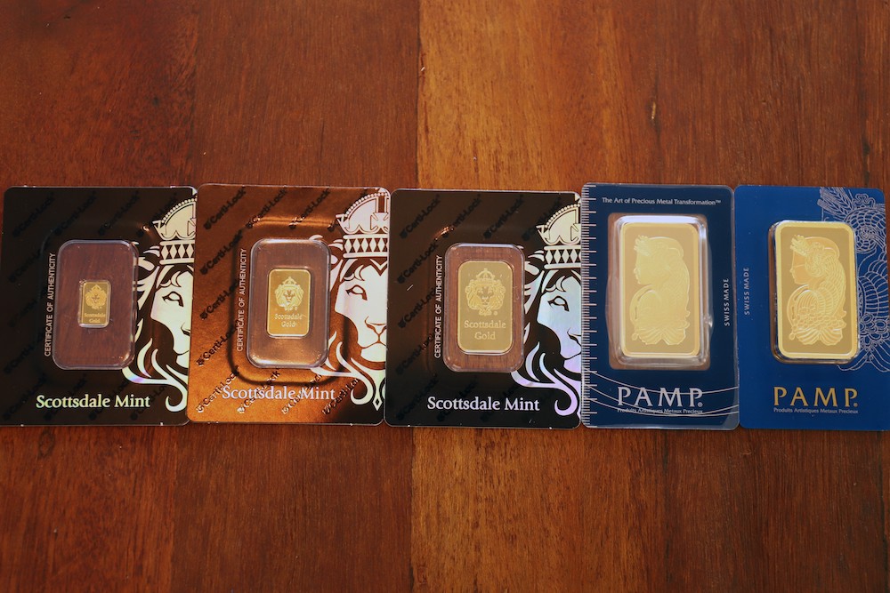 Gold bars weighing 50 and 100 grams are displayed during a media tour of the Singapore Precious Metals Exchange (SGPMX) located at Le Freeport, a private, maximum-security vault in Singapore. u00e2u20acu201d AFP pic