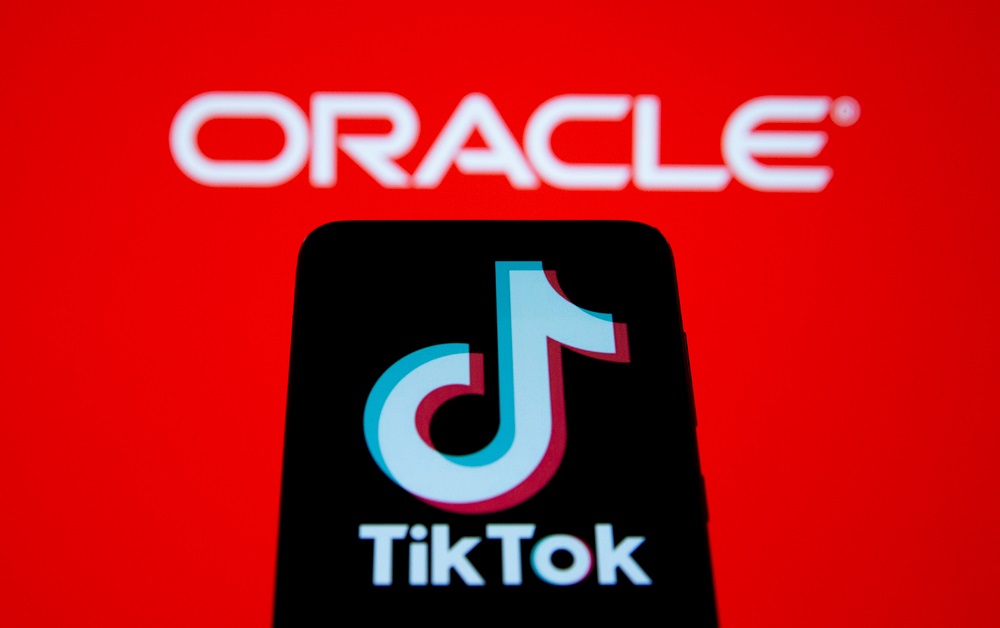 A smartphone with the Tik Tok logo is seen in front of a displayed Oracle logo in this illustration taken, Septemeber 14, 2020. u00e2u20acu201d Reuters pic