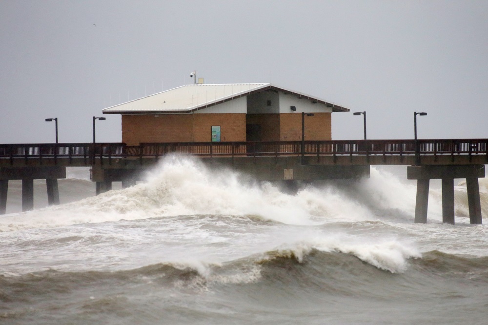 Waves crash along a pier as Hurricane Sally approaches in Gulf Shores, Alabama September 15, 2020. u00e2u20acu201d Reuters pic