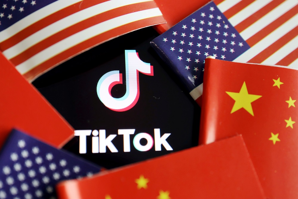 China and US flags are seen near a TikTok logo in this illustration picture taken July 16, 2020. u00e2u20acu201d Reuters pic