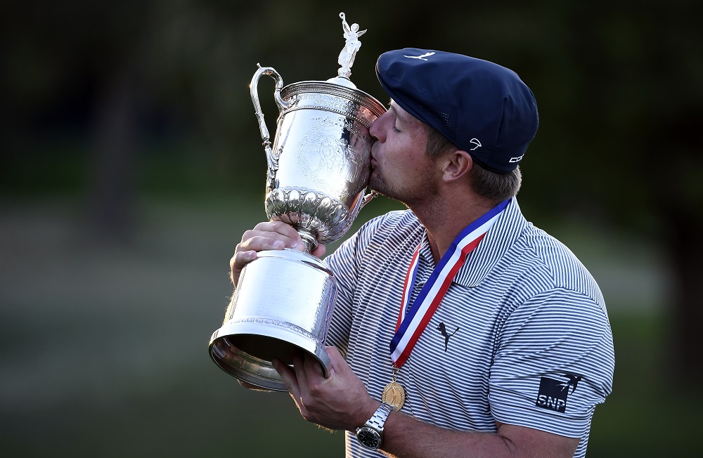Bryson DeChambeau poses and celebrates with the trophy after winning the US Open golf tournament in New York September 20, 2020. u00e2u20acu201d Picture by Danielle Parhizkaran-USA TODAY Sports via Reuters