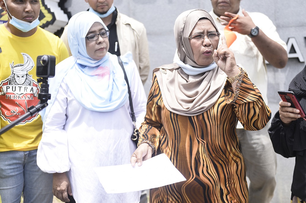 Parti Putra Malaysia deputy president Datuk Hamidah Osman (right) speaks to reporters outside the MACC headquarters in Putrajaya September 2, 2020. u00e2u20acu201d Picture by Miera Zulyana