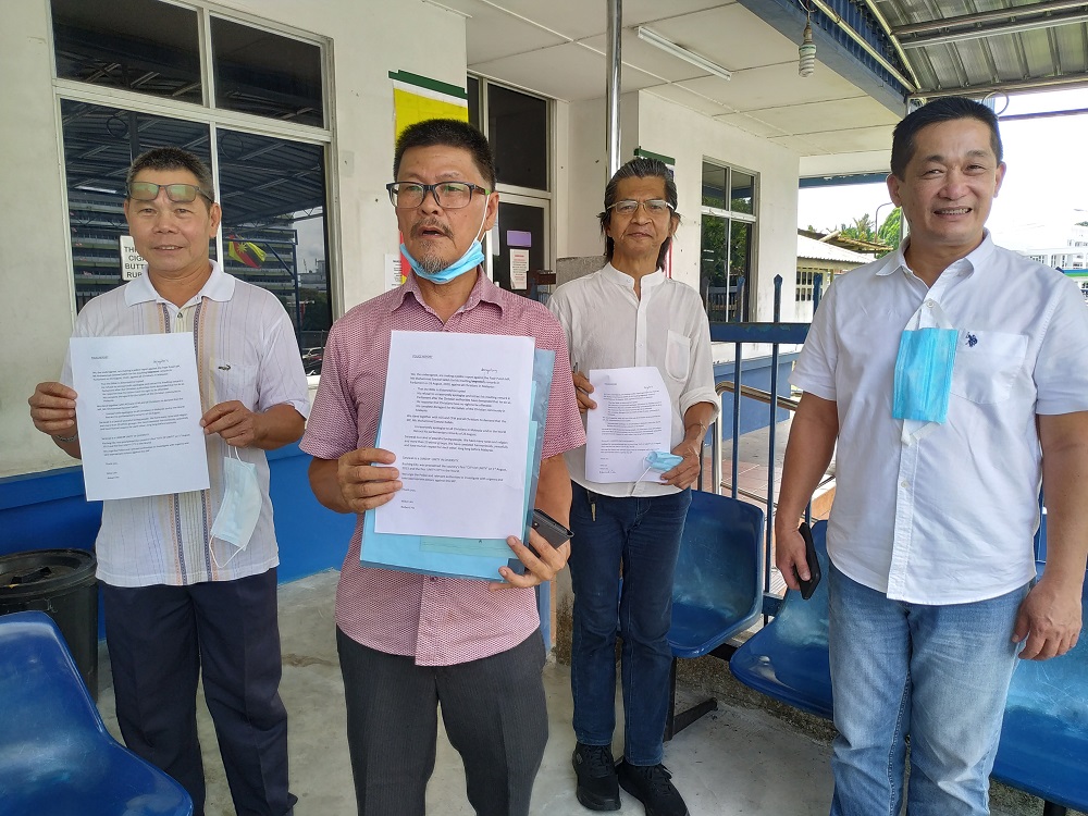 MoCS spokesman Michael Lim (second left) speaking to reporters after lodging the police report against Pasir Puteh MP Nik Muhammad Zawawi Salleh, September 3, 2020. u00e2u20acu201d Picture by Sulok Tawienn