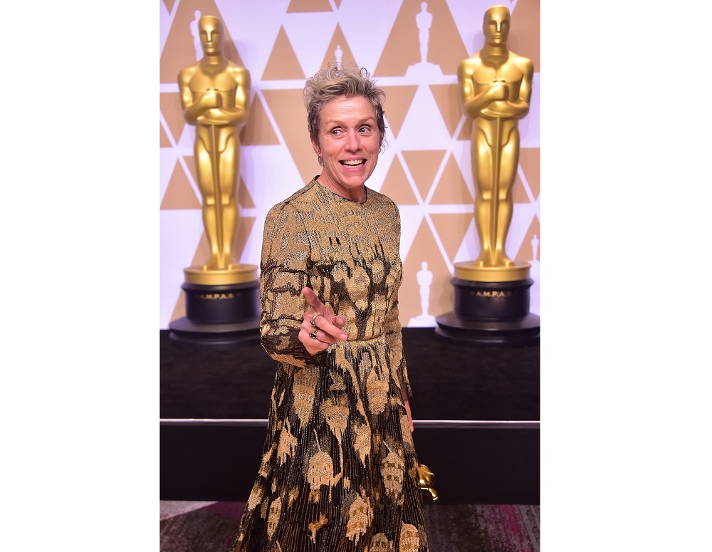 Actress Frances McDormand poses in the press room with the Oscar. u00e2u20acu201d AFP pic