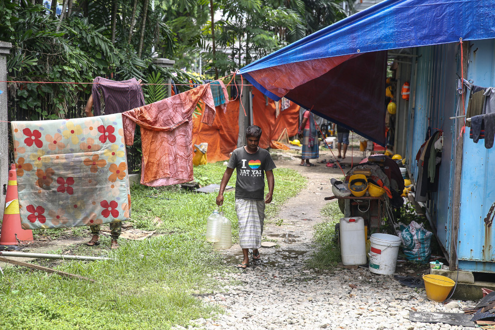 A foreign worker is pictured outside his shared house in Kuala Lumpur September 13, 2020. u00e2u20acu201d Picture by Yusof Mat Isa