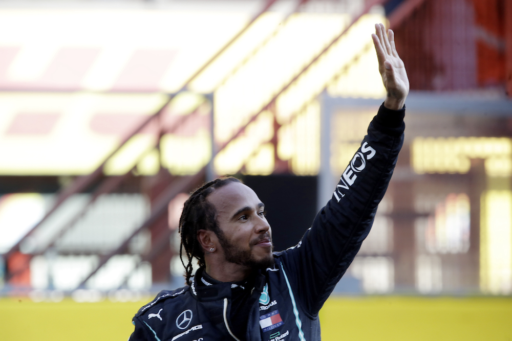 Mercedes' Lewis Hamilton celebrates after winning the Tuscan Grand Prix  at Mugello, Scarperia e San Piero, Italy September 13, 2020. u00e2u20acu201d Reuters picnn