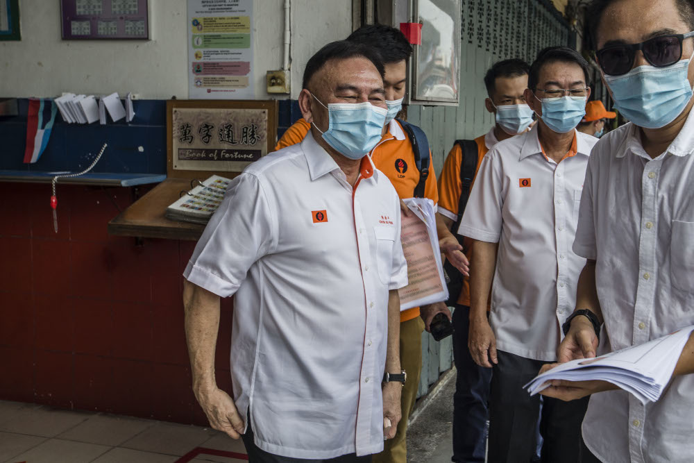 Liberal Democratic Party president Datuk Chin Su Phin conducts a walkabout in Luyang, Sabah September 14, 2020. — Picture by Firdaus Latif