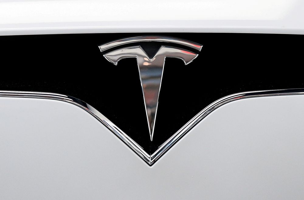 The Tesla logo is seen on a car at Teslau00e2u20acu2122s new showroom in Manhattanu00e2u20acu2122s Meatpacking District in New York City, US, Dec. 14, 2017. u00e2u20acu201d Reuters pic