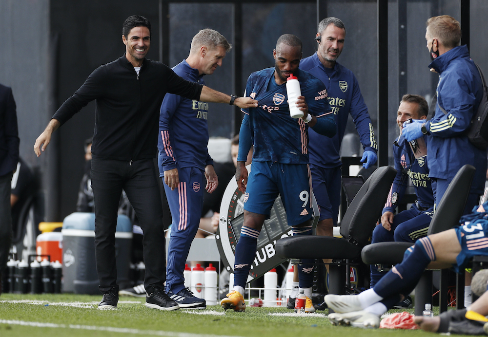 Arsenal manager Mikel Arteta with Alexandre Lacazette after he is substituted during the match against Fulham at Craven Cottage, London, September 12, 2020. u00e2u20acu201d Reuters pic