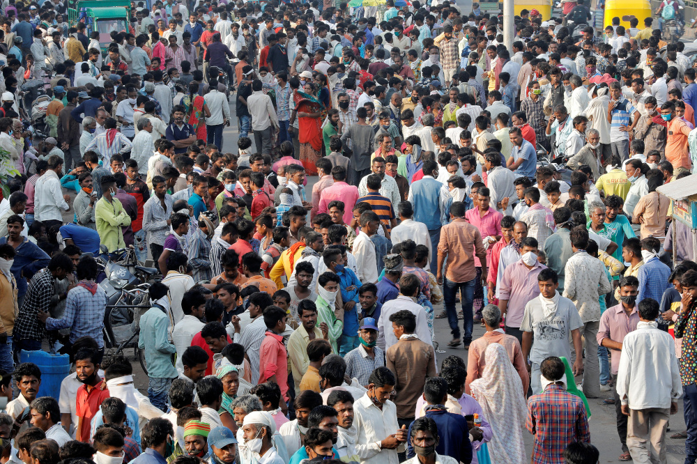 Daily wage migrant labourers gather alongside a road as they wait for work, amidst the coronavirus disease outbreak, in Ahmedabad, India, September 10, 2020. u00e2u20acu201d Reuters pic 