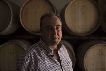 Federico Schatz, German owner of Schatz Wineries, poses in front of wine barrels in Ronda. — AFP-Relaxnews pic
