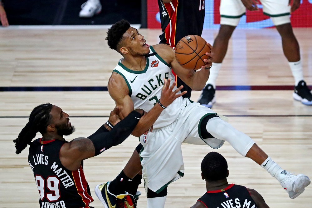 Milwaukee Bucks forward Giannis Antetokounmpo (34) drives to the basket against Miami Heat forward Jae Crowder (99) during the 2020 NBA Playoffs at ESPN Wide World of Sports Complex September 5, 2020. ― Kim Klement-USA TODAY Sports pic via Reuters