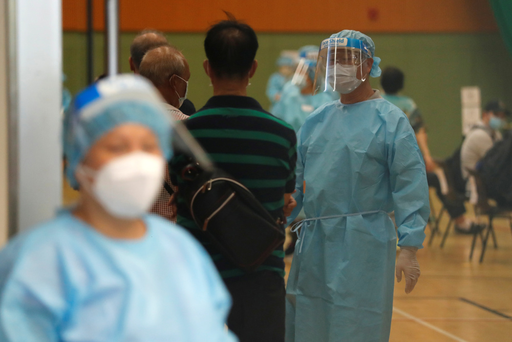 Healthcare workers wearing personal protective equipment (PPE) at the community testing centre for the coronavirus disease in Hong Kong, China September 1, 2020. u00e2u20acu201d Reuters pic 
