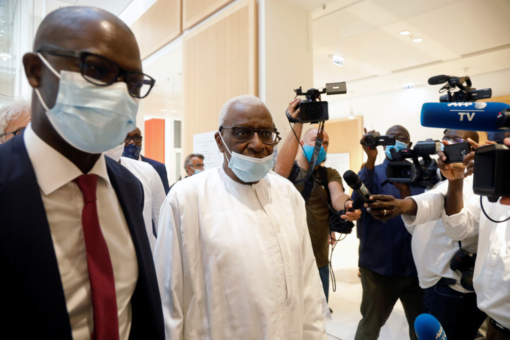 Former President of the International Association of Athletics Federations (IAAF) Lamine Diack, wearing a face mask, arrives with his lawyer Simon Ndiaye for the verdict in his trial at the Paris courthouse, France, September 16, 2020. u00e2u20acu201d Reuters pic