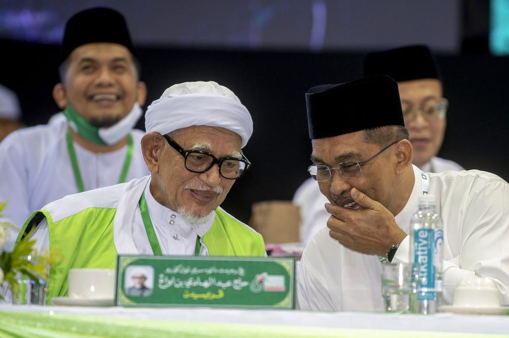 PAS President Datuk Seri Abdul Hadi Awang (left) with Datuk Takiyuddin Hassan after delivering the opening speech of the 66th PAS Annual Congress at the Kelantan Islamic Training Center in Pengkalan Chepa September 13, 2020. u00e2u20acu201d Bernama pic