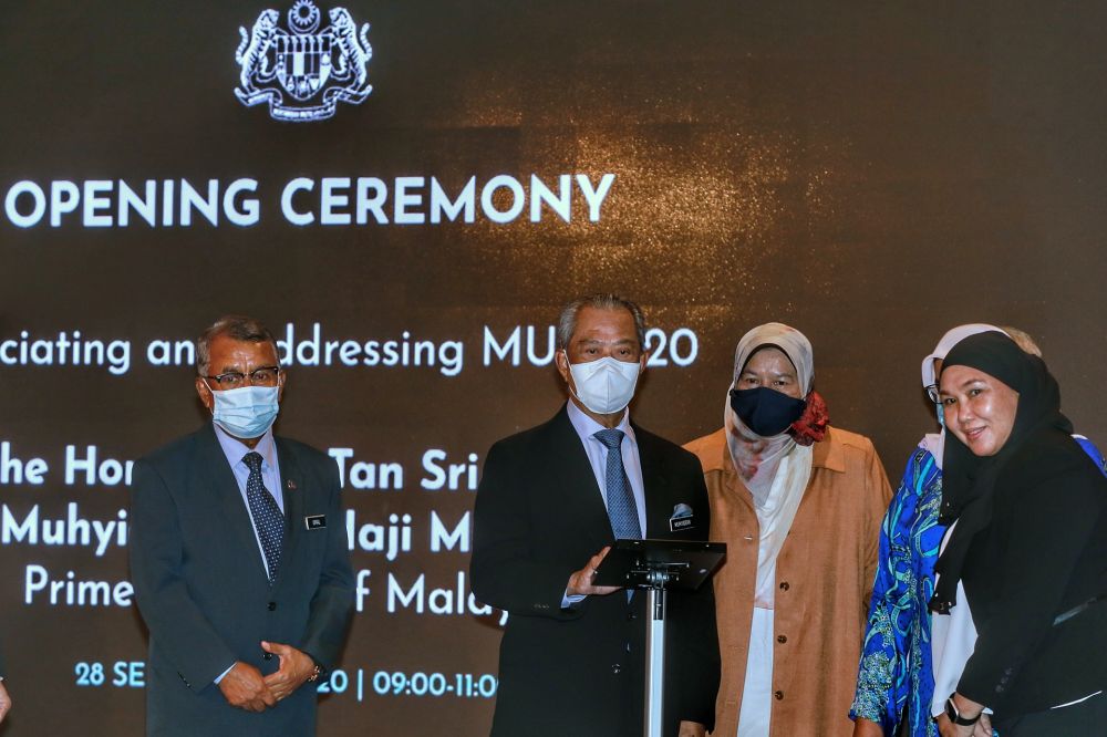Prime Minister Tan Sri Muhyiddin Yassin (centre) officiates the opening ceremony of the Malaysia Urban Forum 2020 in Kuala Lumpur September 28, 2020. u00e2u20acu201d Picture by Ahmad Zamzahuri