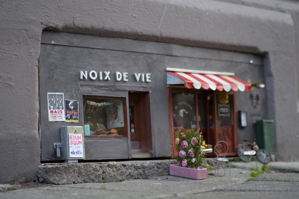 This file photo taken on December 9, 2016 shows a street installation of a mini restaurant and deli-shop for mice created by Swedish artist collective ”Anonymouse” in central Malmo, Sweden. — AFP pic
